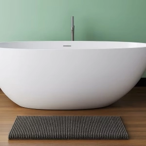 Rimini RockSolid stenbadekar 145 cm i badeværelsesmiljø. Fra SPA Kompagniet.